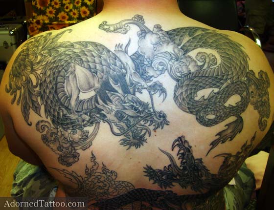 duelling Japanese dragons back tattoo